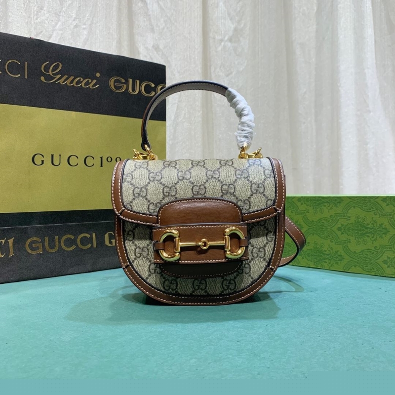 G*u*i top handle bags